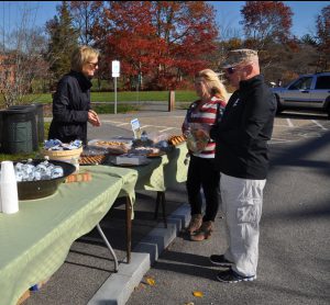 Friends of the South River Park and Greenway serve veterans Mark and Nancy Bulger, USMC, at the South River Park in Marshfield.