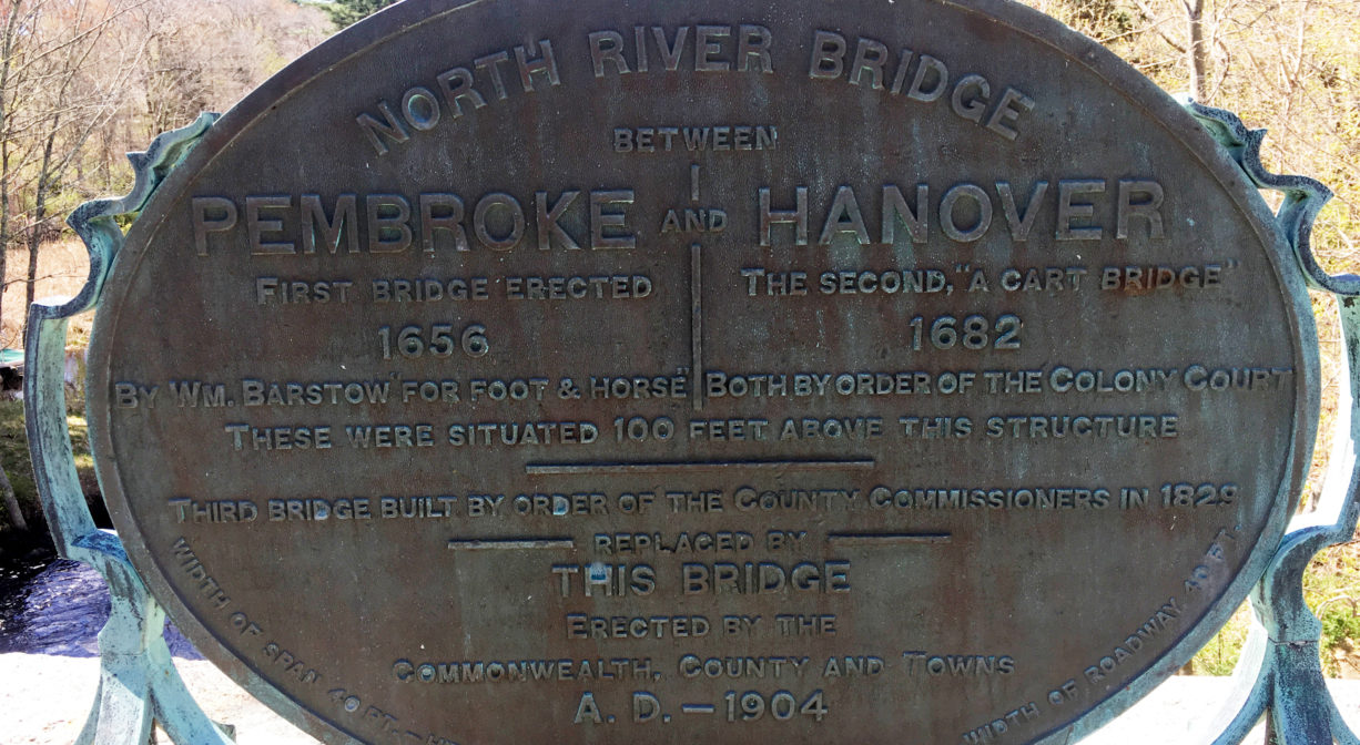 A close-up photograph of a historic marker.