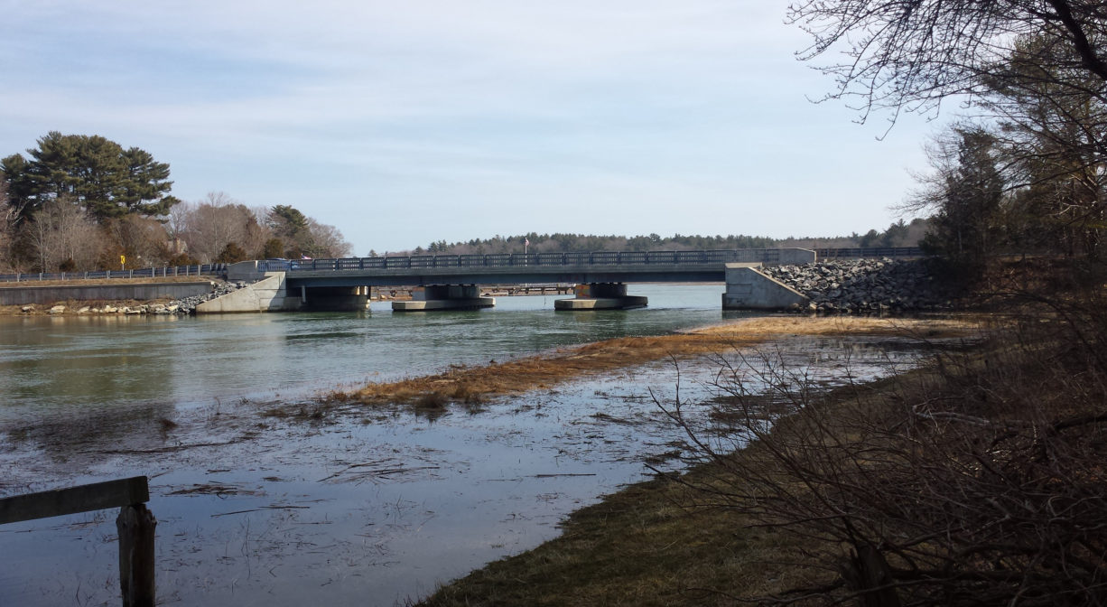 A photograph of a bridge over a river.