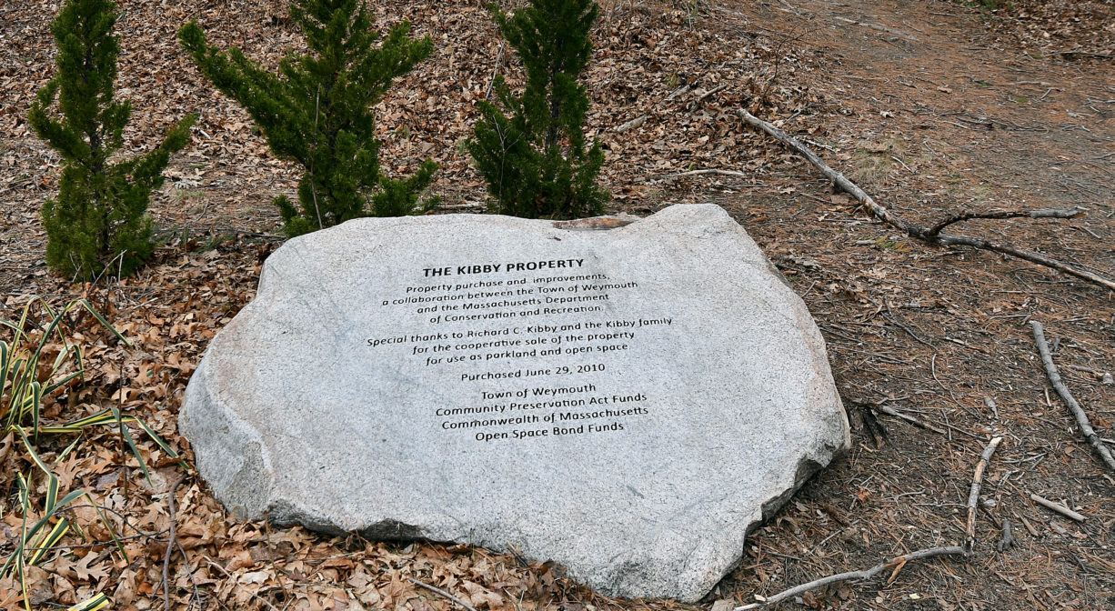 A photograph of a memorial stone.