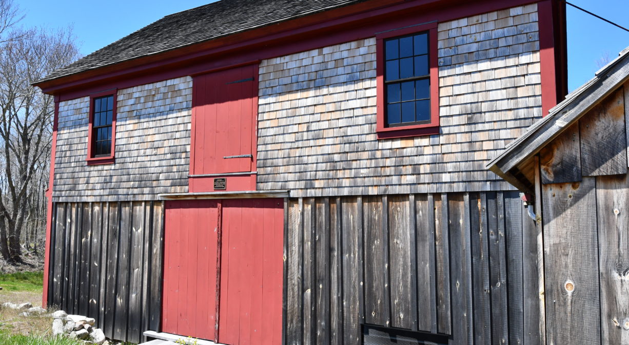 A photograph of a restored mill building.