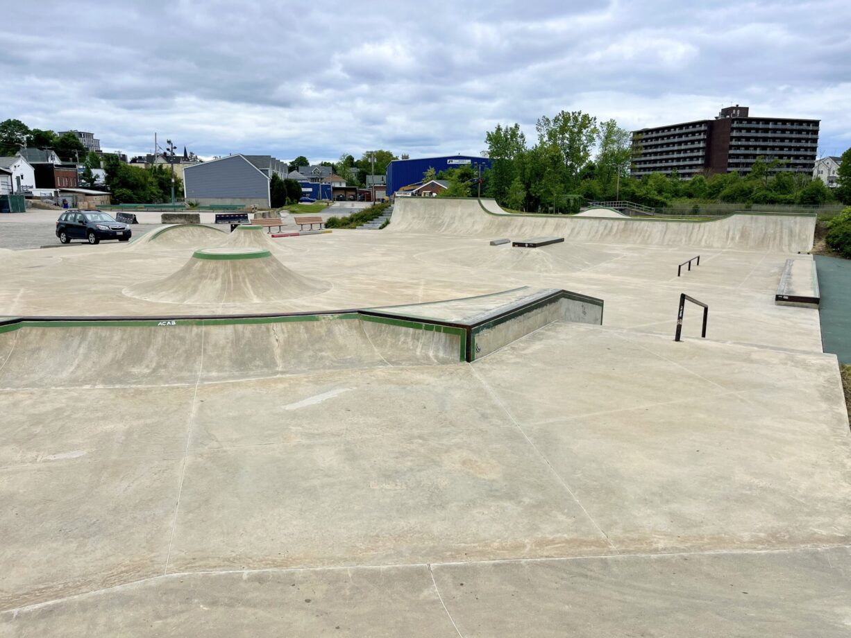 A photograph of a large skate park.
